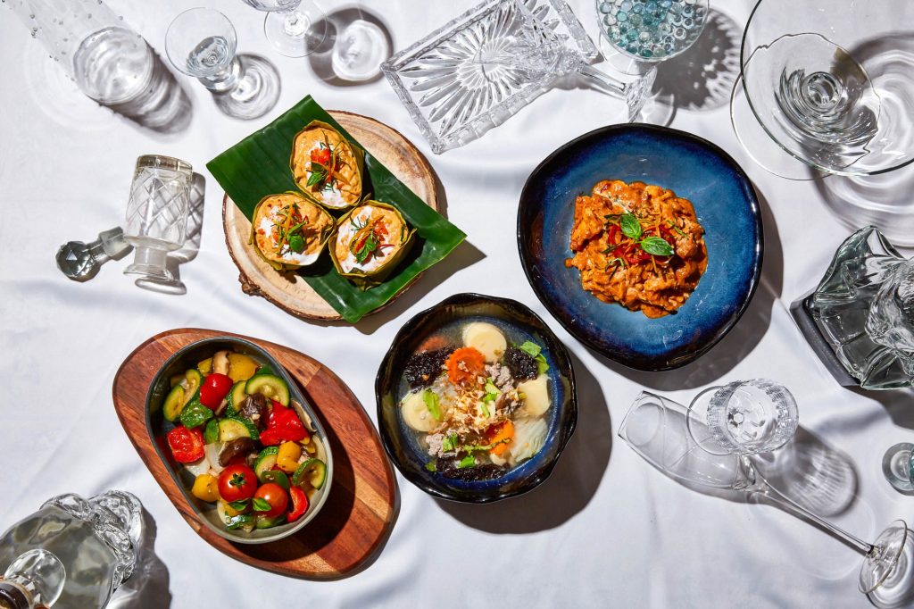 Thai sharing dishes served in bowls at TUBA Bangkok